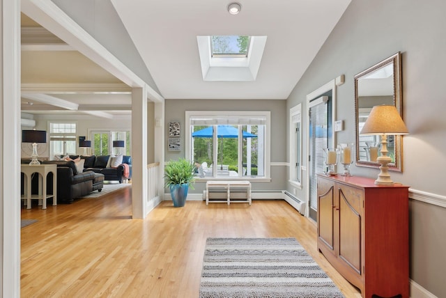71 N St, Kennebunkport, ME 04046 - entryway with light wood finished floors, a skylight, baseboards, and a baseboard heating unit