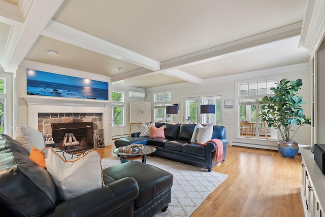 71 N St, Kennebunkport, ME 04046 - living area featuring ornamental molding, light wood finished floors, beam ceiling, a baseboard radiator, and healthy amount of natural light
