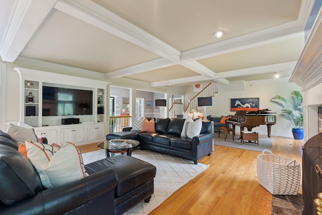 71 N St, Kennebunkport, ME 04046 - living area featuring beam ceiling, light wood-style floors, stairs, crown molding, and baseboards