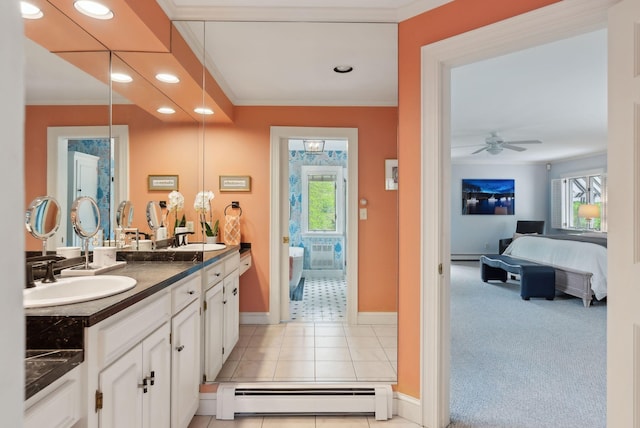 71 N St, Kennebunkport, ME 04046 - ensuite bathroom featuring a baseboard heating unit, ornamental molding, recessed lighting, baseboards, and a ceiling fan
