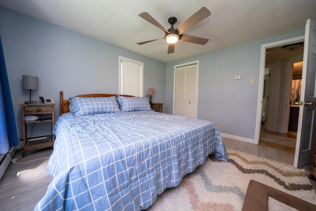 22 Meadow Rd, Hampden, ME 04444 - bedroom featuring light wood-style flooring, a closet, baseboards, and ceiling fan