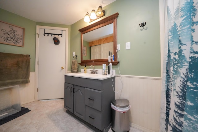 22 Meadow Rd, Hampden, ME 04444 - full bathroom with wainscoting and vanity