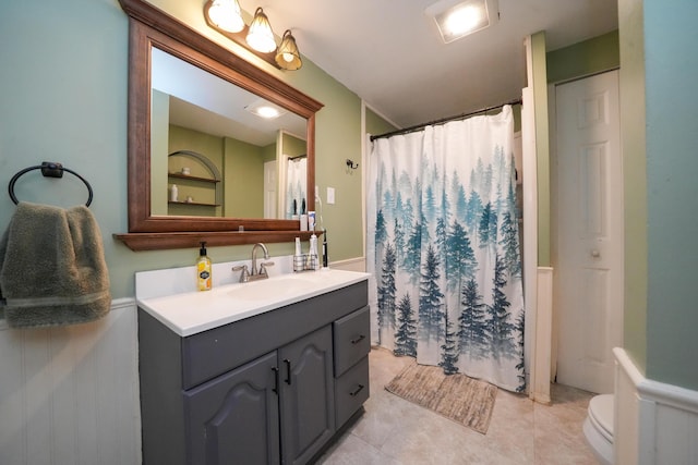 22 Meadow Rd, Hampden, ME 04444 - bathroom with vanity, toilet, tile patterned flooring, and a shower with curtain