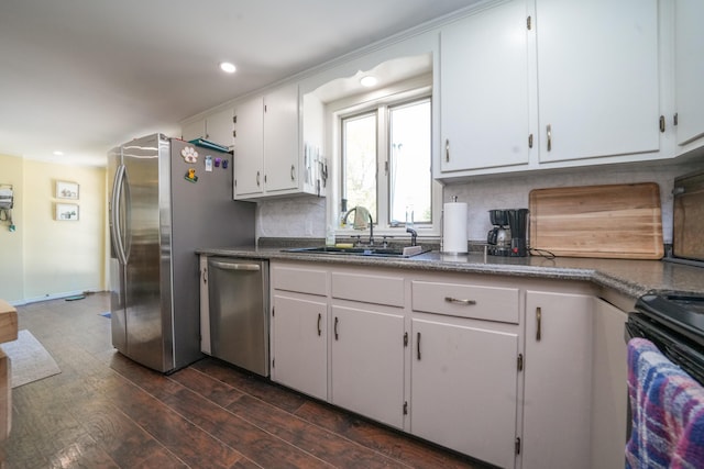 22 Meadow Rd, Hampden, ME 04444 - kitchen with appliances with stainless steel finishes, a sink, dark wood finished floors, backsplash, and white cabinets