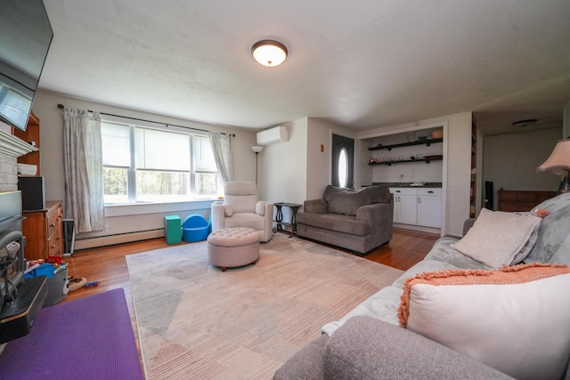 22 Meadow Rd, Hampden, ME 04444 - living area featuring a wall mounted air conditioner, wood finished floors, and a baseboard heating unit