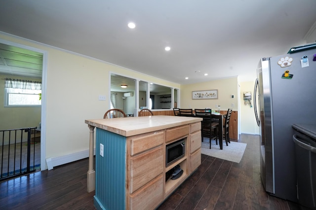 22 Meadow Rd, Hampden, ME 04444 - kitchen with a baseboard radiator, stainless steel appliances, dark wood-type flooring, a breakfast bar area, and recessed lighting