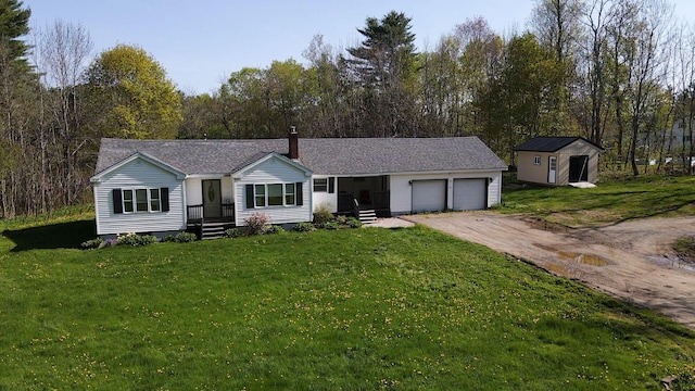 22 Meadow Rd, Hampden, ME 04444 - ranch-style house featuring a garage, driveway, a front lawn, and a chimney