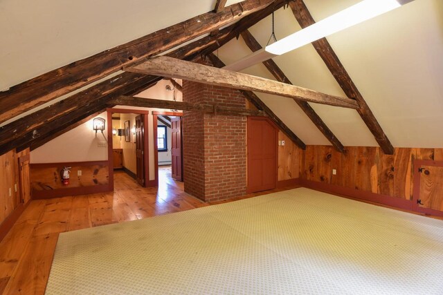 306 Campbell Rd, Leeds, ME 04263 - additional living space with light wood-type flooring and wooden walls
