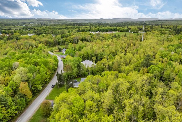 66 Mcnally Rd, Clinton, ME 04927 - aerial view of a heavily wooded area