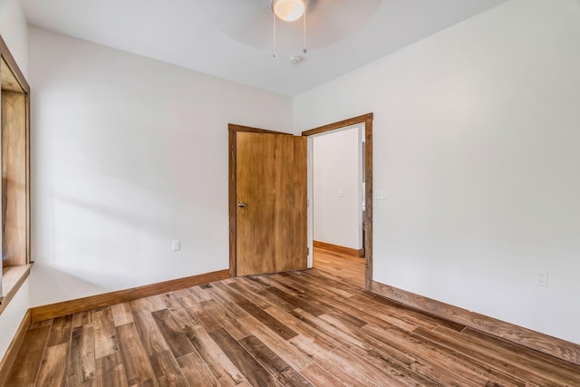 66 Mcnally Rd, Clinton, ME 04927 - unfurnished room featuring ceiling fan, wood finished floors, and baseboards