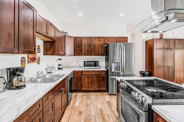 66 Mcnally Rd, Clinton, ME 04927 - kitchen with appliances with stainless steel finishes, exhaust hood, a sink, light wood finished floors, and light stone countertops