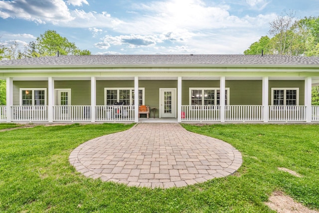 66 Mcnally Rd, Clinton, ME 04927 - back of property featuring a porch and a yard