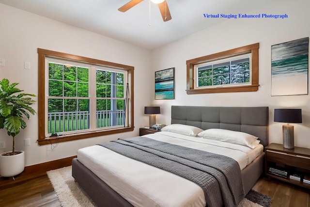 66 Mcnally Rd, Clinton, ME 04927 - bedroom with wood finished floors, ceiling fan, and baseboards