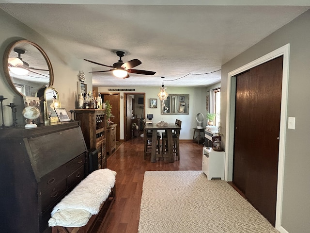208 New Rd, Arundel, ME 04046 - dining room featuring dark wood finished floors and a ceiling fan