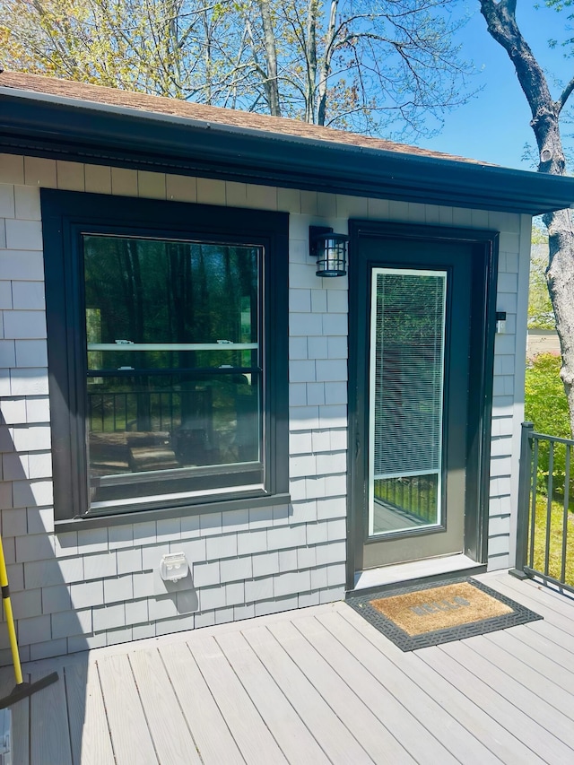 208 New Rd, Arundel, ME 04046 - entrance to property with a wooden deck