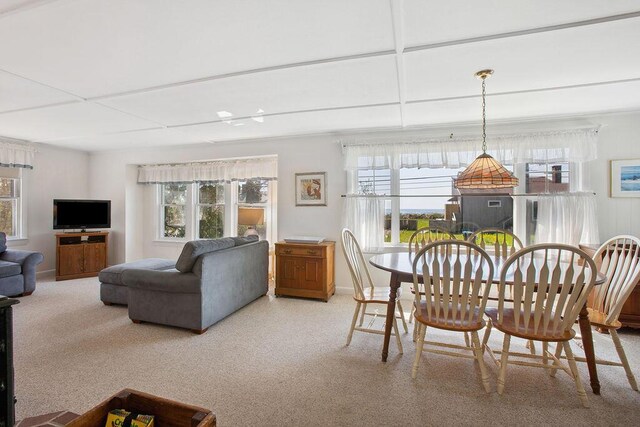 688 Kings Hwy, Kennebunkport, ME 04046 - dining area with healthy amount of natural light, baseboards, and carpet