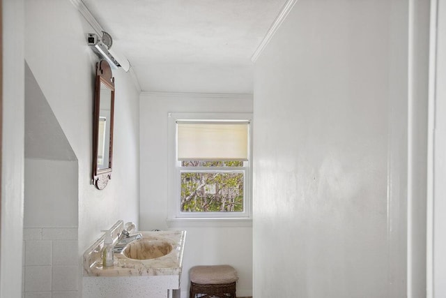 688 Kings Hwy, Kennebunkport, ME 04046 - bathroom featuring vanity and ornamental molding