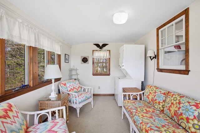 688 Kings Hwy, Kennebunkport, ME 04046 - sitting room with stacked washer / dryer and light colored carpet