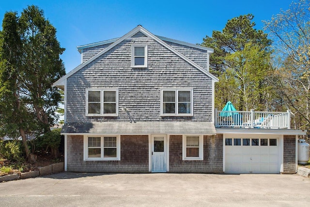 688 Kings Hwy, Kennebunkport, ME 04046 - view of front of home featuring a balcony, driveway, and an attached garage