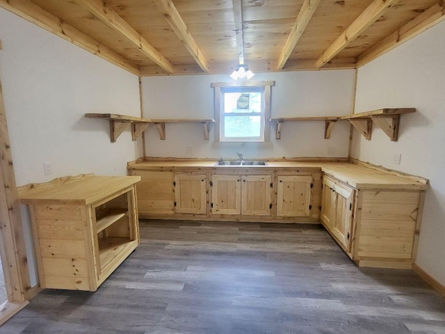 147 Keep Rd, Jay, ME 04239 - kitchen with open shelves, light brown cabinets, wood ceiling with exposed beams, a sink, and wood finished floors