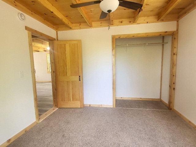 147 Keep Rd, Jay, ME 04239 - unfurnished bedroom featuring carpet flooring, wooden ceiling with exposed beams, baseboards, and a ceiling fan