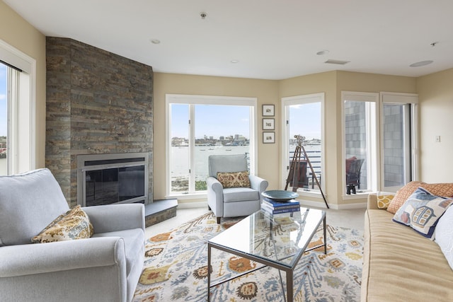 215 High St Unit 101, South Portland, ME 04106 - living room featuring carpet floors and a fireplace
