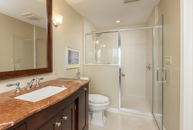 215 High St Unit 101, South Portland, ME 04106 - full bathroom with vanity, toilet, tile patterned floors, and a stall shower
