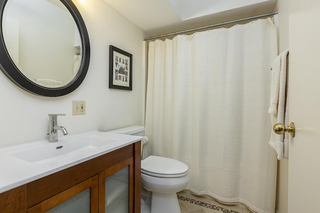 215 High St Unit 101, South Portland, ME 04106 - bathroom with tile patterned flooring, toilet, vanity, and a shower with curtain