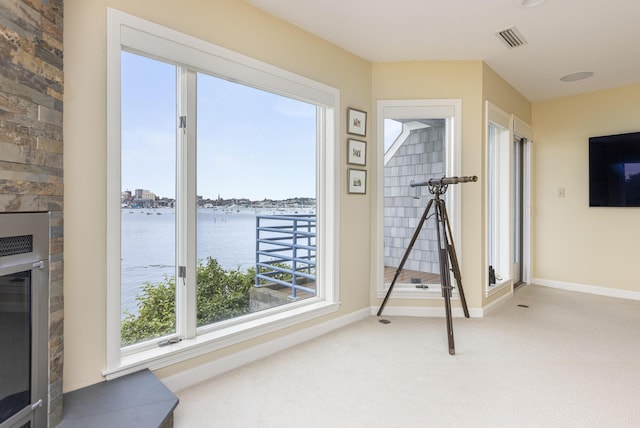 215 High St Unit 101, South Portland, ME 04106 - workout room with baseboards and light colored carpet