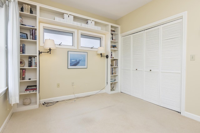 215 High St Unit 101, South Portland, ME 04106 - unfurnished bedroom featuring carpet floors and a closet