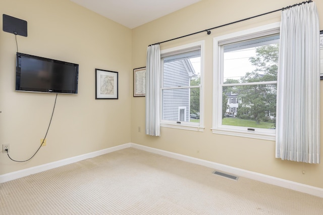 215 High St Unit 101, South Portland, ME 04106 - spare room featuring carpet flooring and baseboards