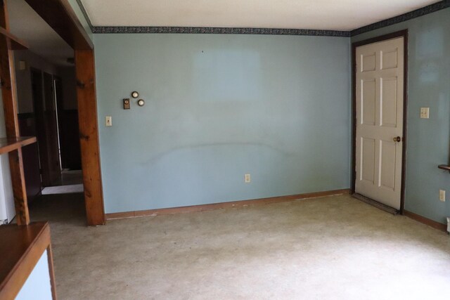 113 Pleasant St, Greenville, ME 04441 - empty room featuring light colored carpet and baseboards