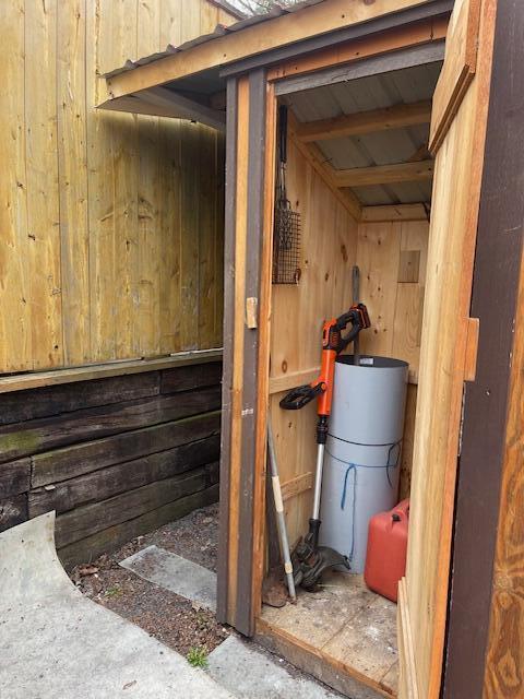 145 12th Ave, Madawaska, ME 04756 - utility room with water heater