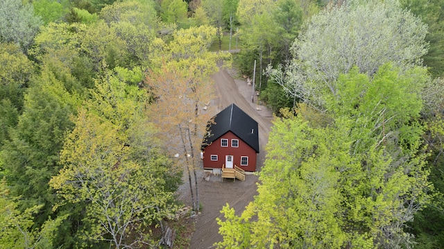 23 Bray Cir, Passadumkeag, ME 04475 - view from above of property with a heavily wooded area