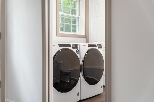 23 Bray Cir, Passadumkeag, ME 04475 - laundry area with separate washer and dryer and dark wood-type flooring