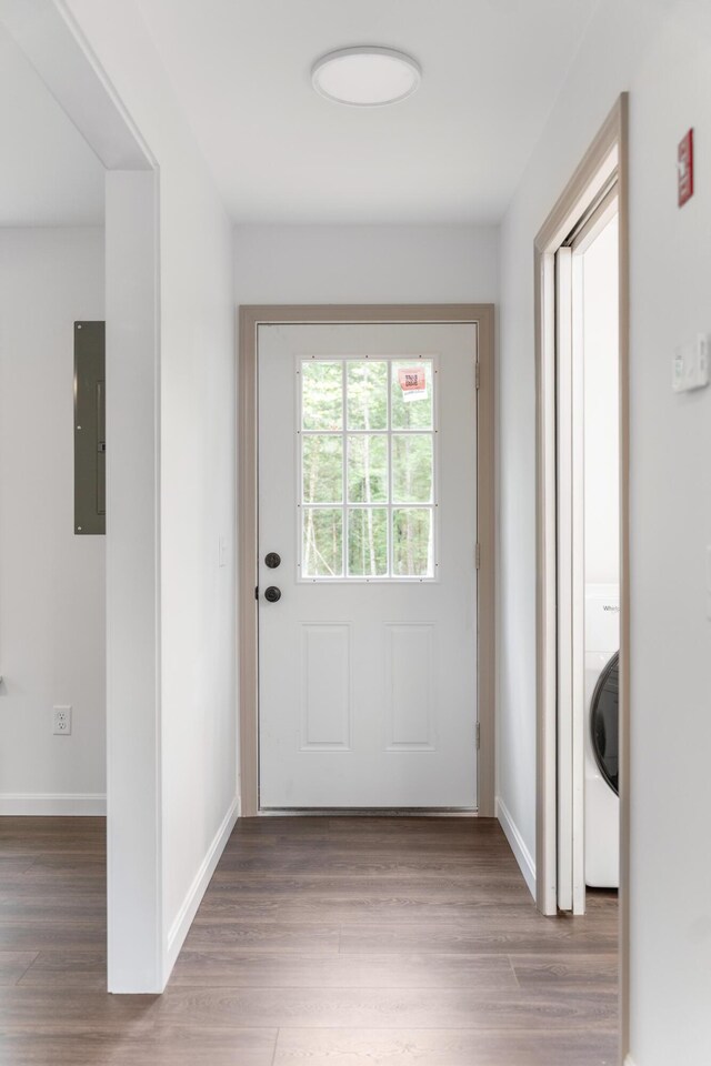 23 Bray Cir, Passadumkeag, ME 04475 - doorway to outside with electric panel, wood finished floors, and baseboards