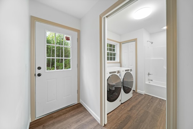 23 Bray Cir, Passadumkeag, ME 04475 - washroom with washing machine and dryer, dark wood-type flooring, and baseboards