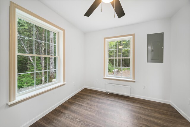 23 Bray Cir, Passadumkeag, ME 04475 - unfurnished room with radiator, electric panel, plenty of natural light, and ceiling fan