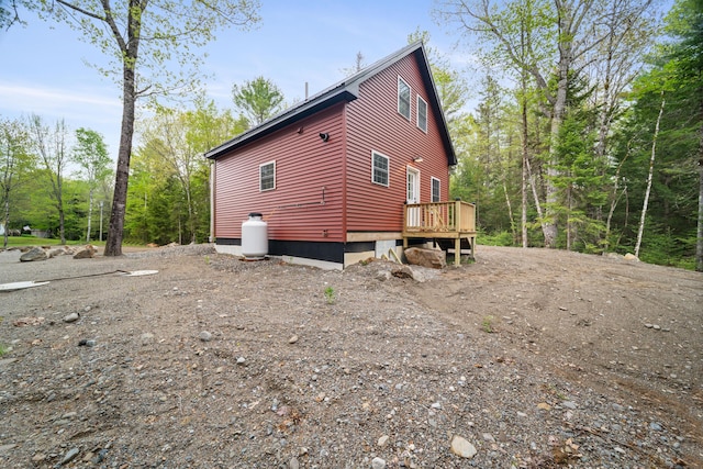 23 Bray Cir, Passadumkeag, ME 04475 - view of home's exterior with a deck
