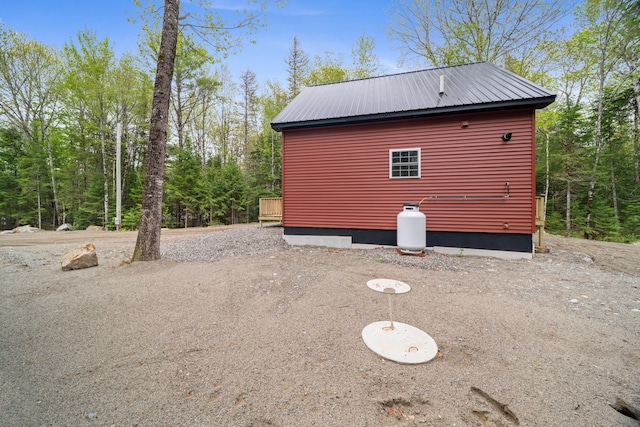 23 Bray Cir, Passadumkeag, ME 04475 - view of home's exterior with metal roof