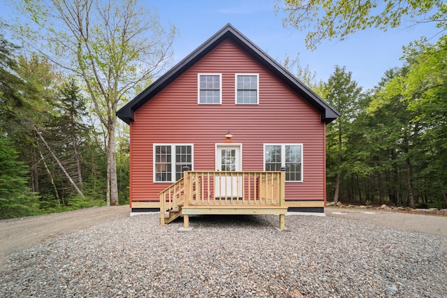 23 Bray Cir, Passadumkeag, ME 04475 - rear view of house with a wooden deck