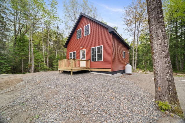23 Bray Cir, Passadumkeag, ME 04475 - view of home's exterior featuring a wooden deck
