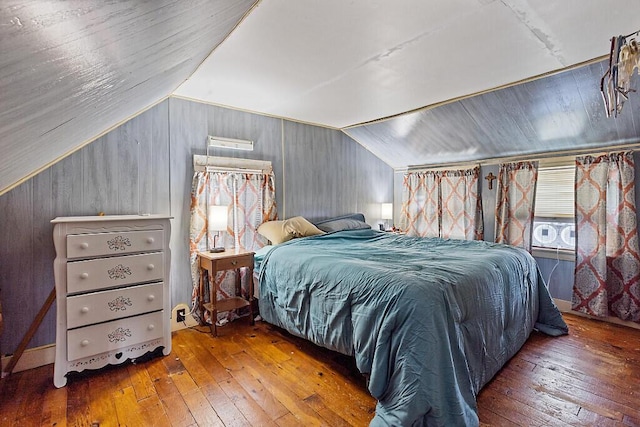 753 Ridge Rd, Windsor, ME 04363 - bedroom with wood-type flooring, vaulted ceiling, and wood walls