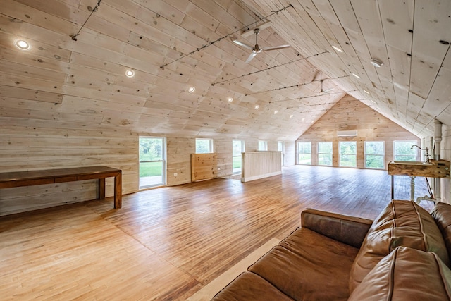 76 Old W Bethel Road, Albany Twp, ME 04217 - living area with wood ceiling, wood walls, vaulted ceiling, light wood finished floors, and recessed lighting