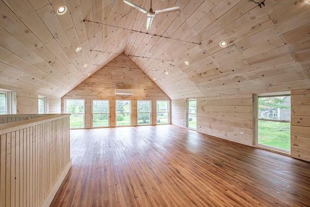 76 Old W Bethel Road, Albany Twp, ME 04217 - unfurnished living room with wooden walls, wooden ceiling, lofted ceiling, hardwood / wood-style floors, and a ceiling fan