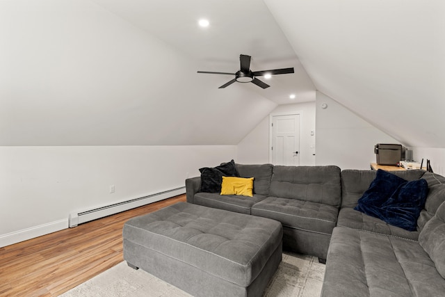 64 Autumn Rdg, Sabattus, ME 04280 - living room featuring a baseboard radiator, wood finished floors, vaulted ceiling, ceiling fan, and baseboards