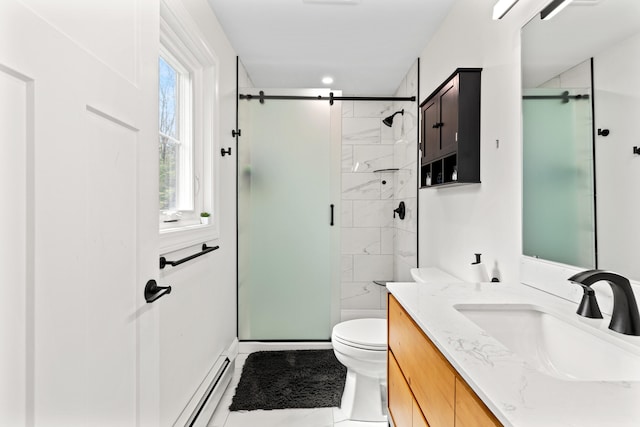 64 Autumn Rdg, Sabattus, ME 04280 - bathroom featuring toilet, vanity, a shower stall, tile patterned floors, and a baseboard heating unit