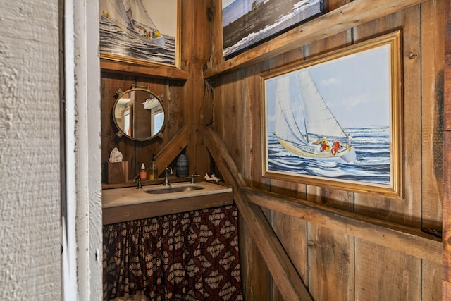 104 Summer St, Kennebunk, ME 04043 - bathroom featuring wood walls and vanity