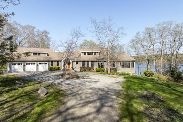 50 Higbee Ln, Boothbay, ME 04571 - shingle-style home featuring asphalt driveway and a front yard