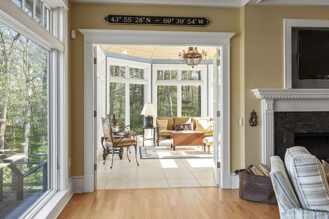 50 Higbee Ln, Boothbay, ME 04571 - sunroom / solarium with healthy amount of natural light and a chandelier